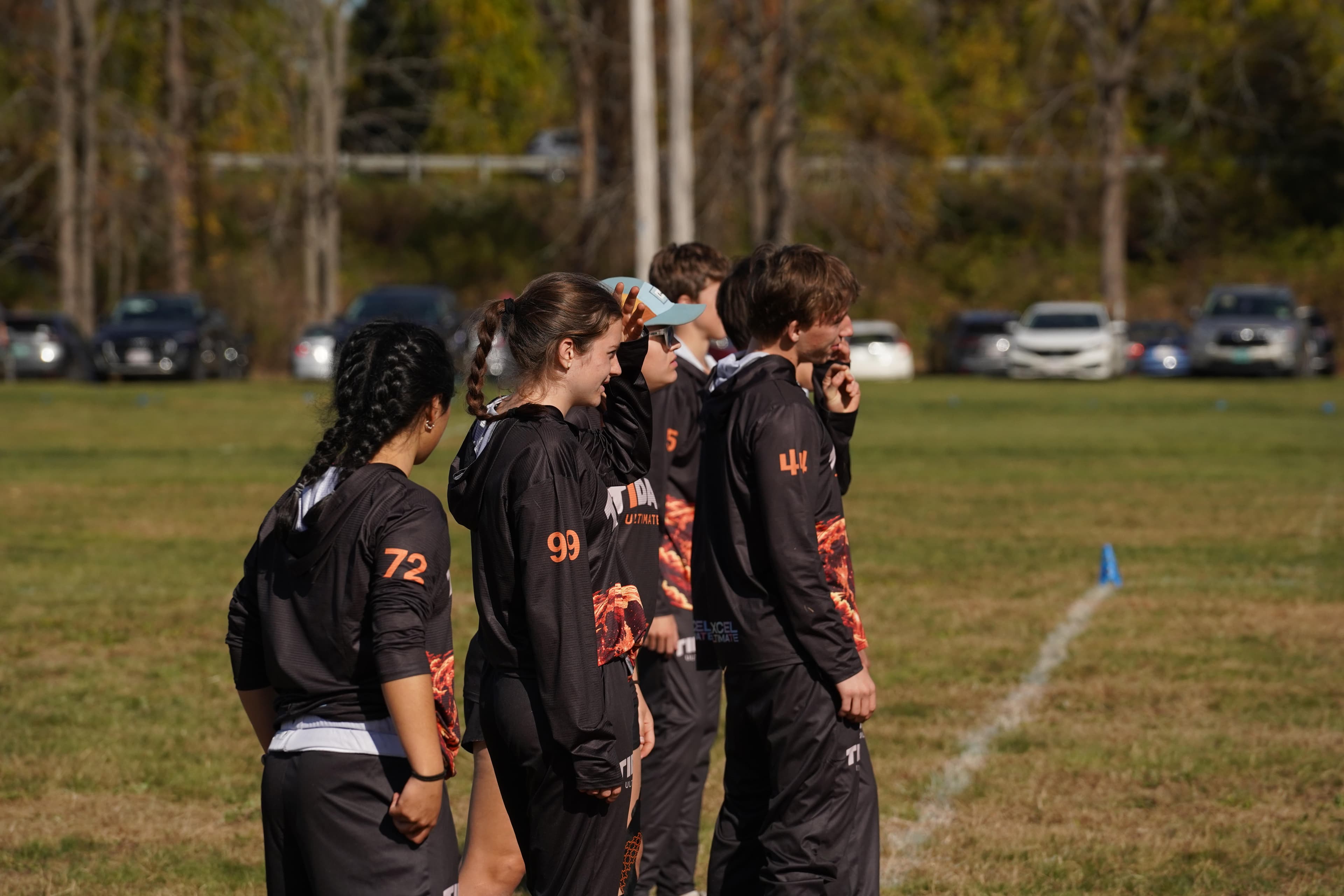 Tidal Ultimate players in a team huddle